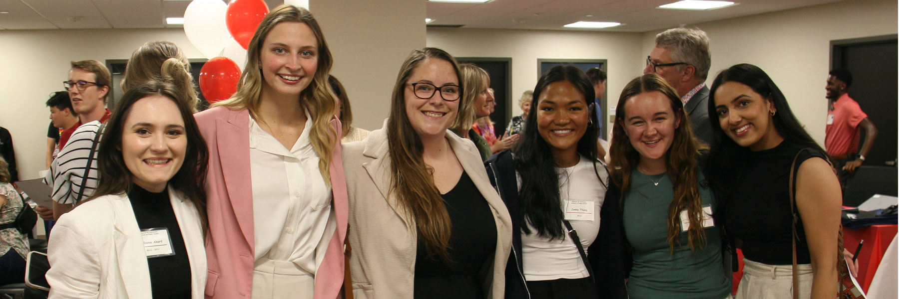 6 public health students posing at graduate orientation