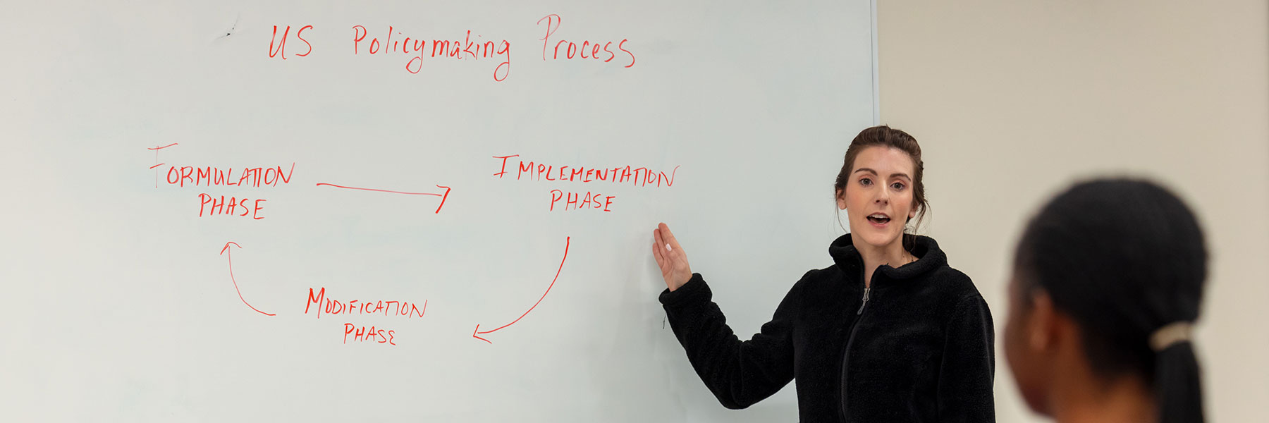 assistant professor heather taylor instructing in classroom