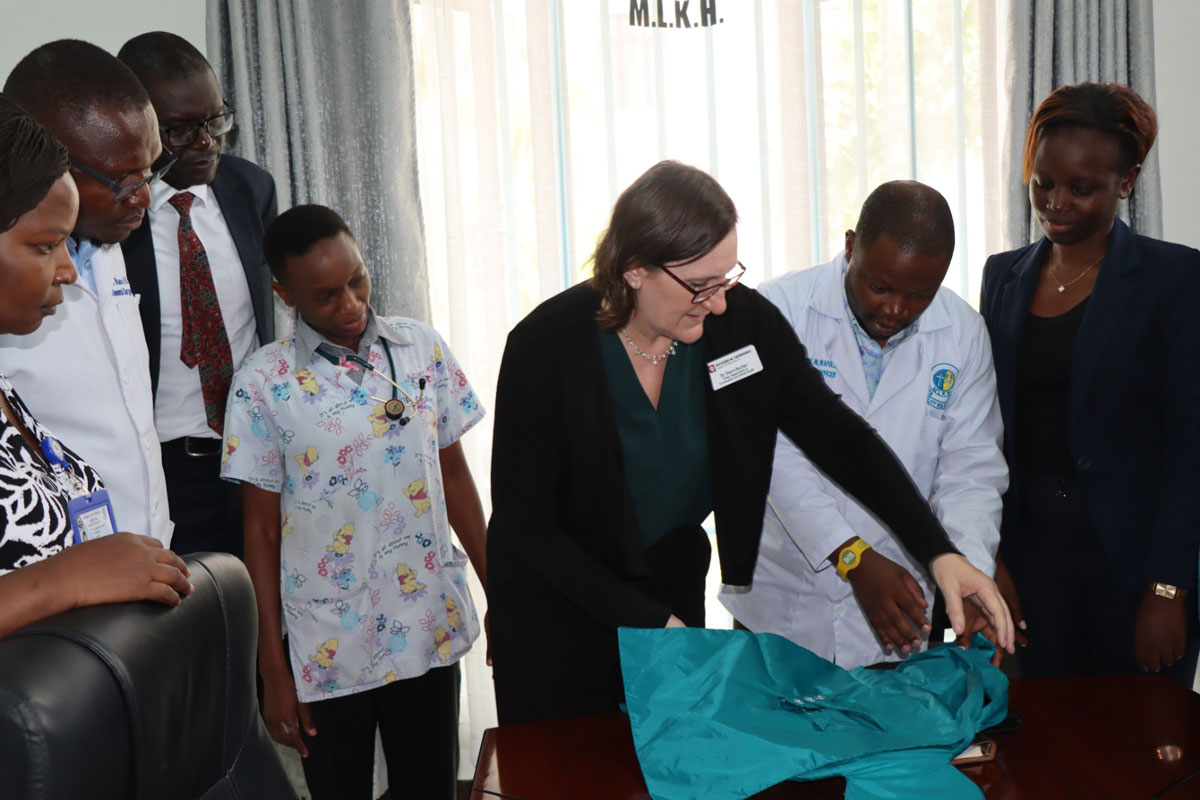 Sherri Bucher presents revised prototypes for the patented NeoWarm biomedical device to Mama Lucy Kibaki Hospital for additional feedback from key stakeholders.