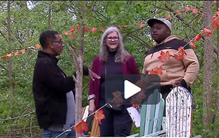 DIP-IN's Lisa Staten and Ron Rice speaking to community member