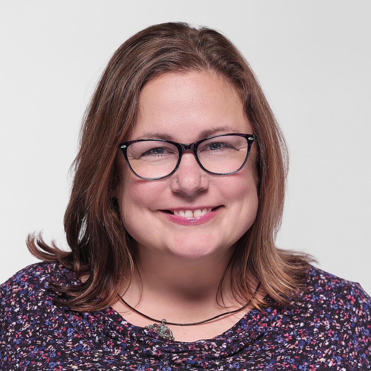 headshot of Kate Caufield
