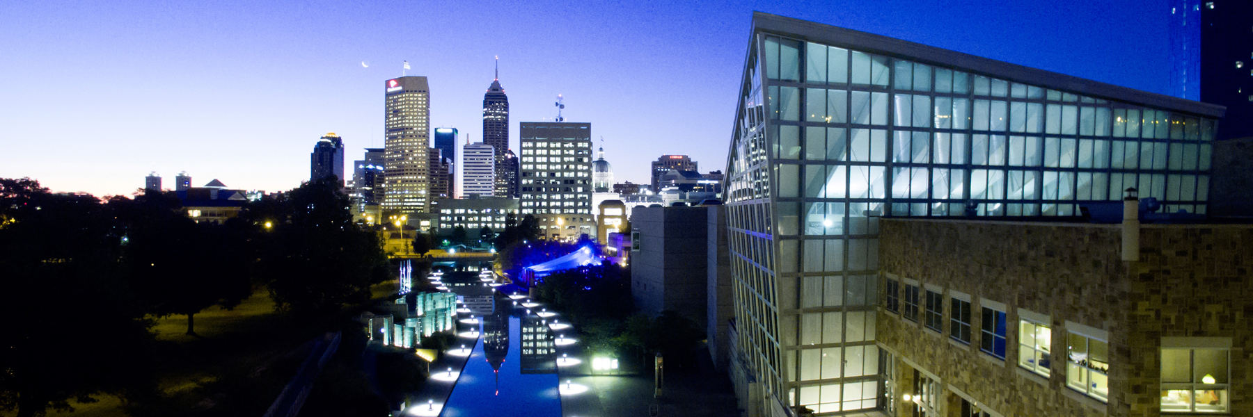 Indianapolis canal with downtown buildings in the background at night